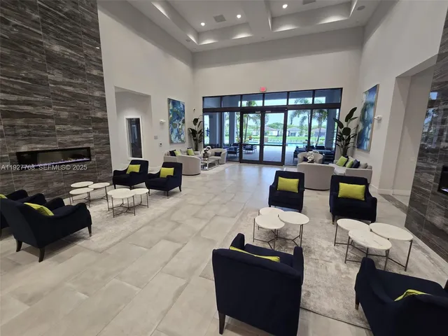 a kitchen with stainless steel appliances a refrigerator sink and cabinets