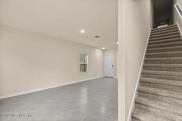 a view of an entryway with stairs