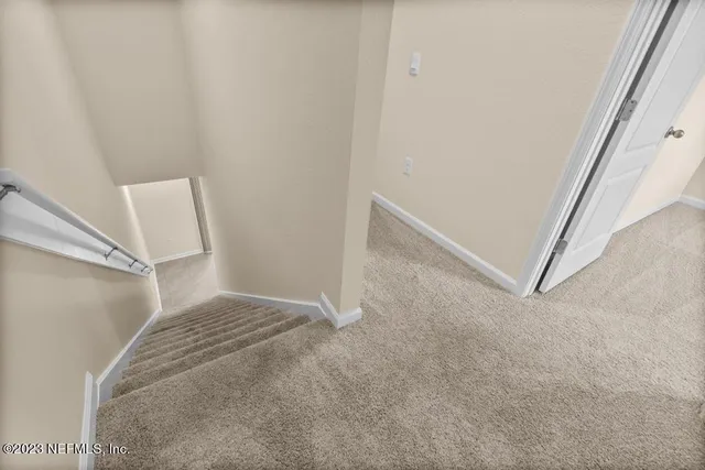 an empty room with closet area