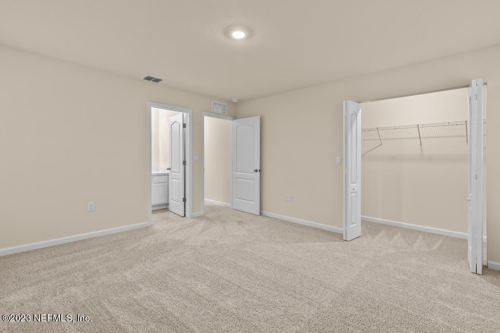 279 Talulla Trail St. Augustine, FL 32095 - Photo 23 of 52 an empty room with closet area