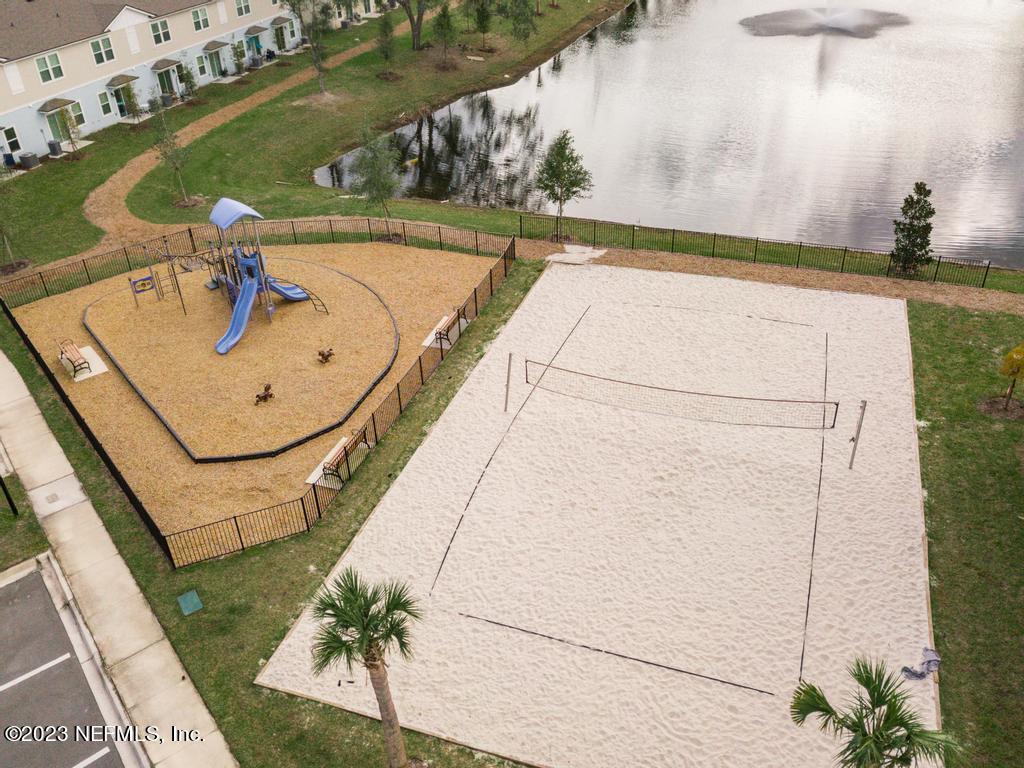 279 Talulla Trail St. Augustine, FL 32095 - Photo 39 of 52 a bathroom with a sink and mirror