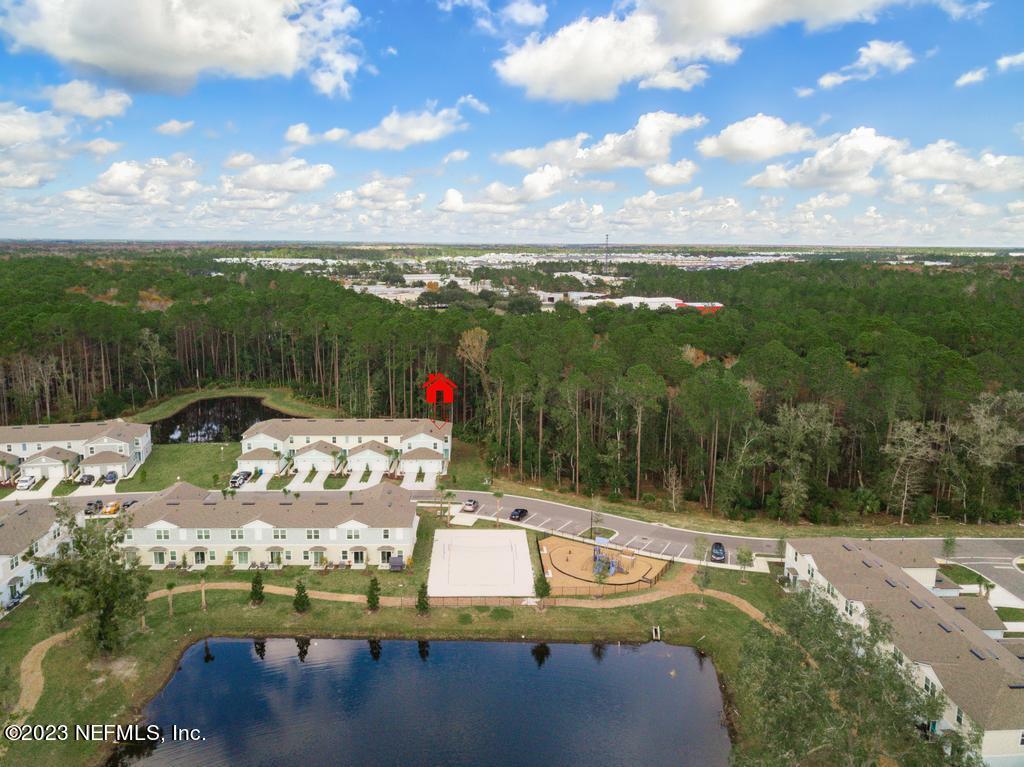 279 Talulla Trail St. Augustine, FL 32095 - Photo 40 of 52 a view of a swimming pool with a yard
