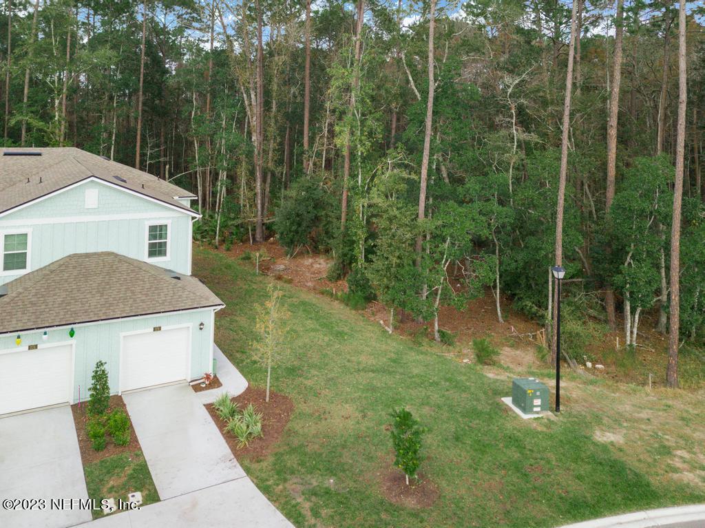 279 Talulla Trail St. Augustine, FL 32095 - Photo 49 of 52 a view of a house with a backyard