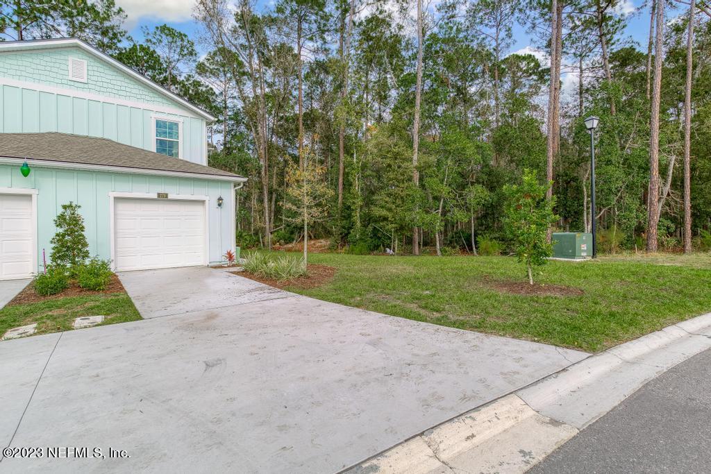 279 Talulla Trail St. Augustine, FL 32095 - Photo 50 of 52 front view of a house with a yard