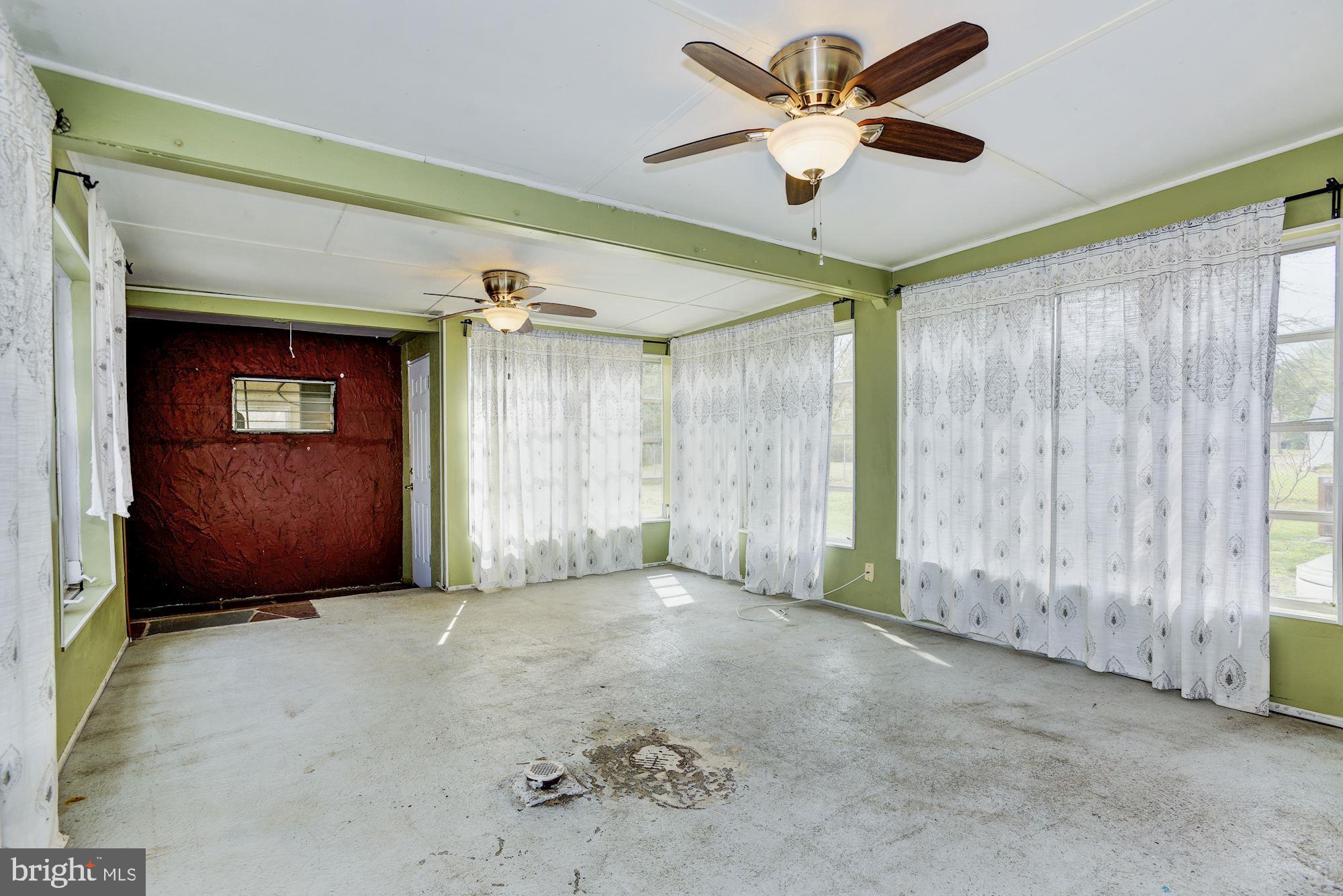 4404 Church Road Mount Laurel, NJ 08054 - Photo 20 of 22 a view of an empty room and a ceiling fan