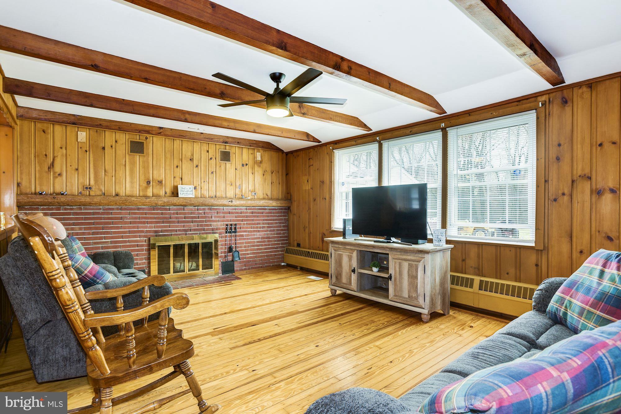 4404 Church Road Mount Laurel, NJ 08054 - Photo 5 of 22 a living room with furniture and a flat screen tv