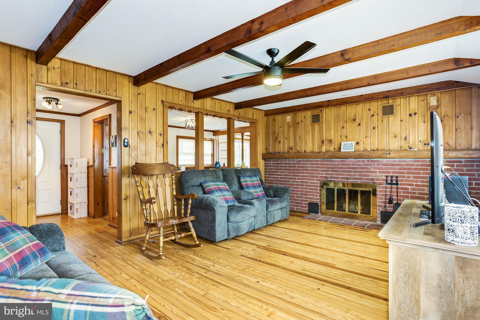 4404 Church Road Mount Laurel, NJ 08054 - Photo 6 of 22 a view of a livingroom with furniture and a fireplace
