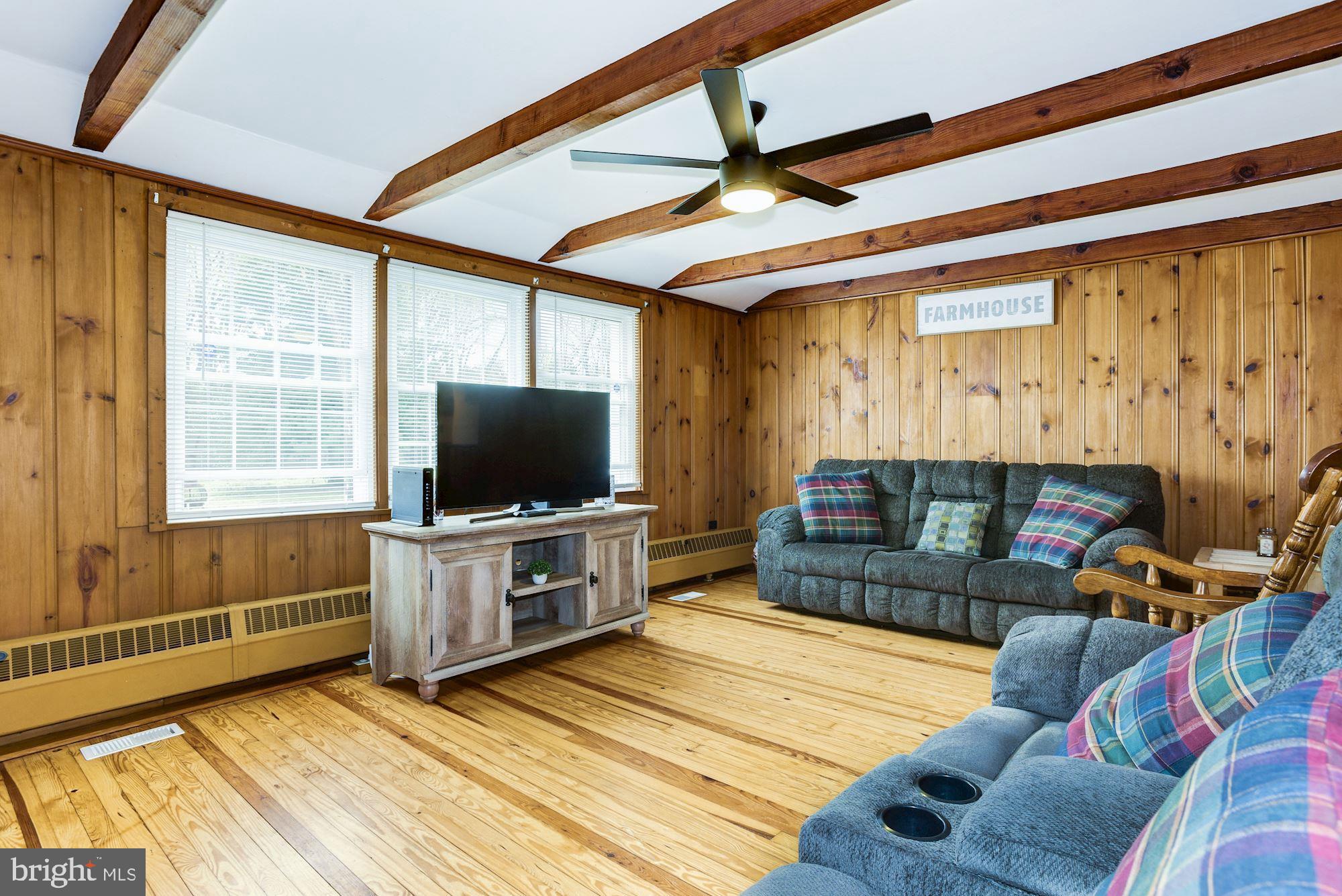 4404 Church Road Mount Laurel, NJ 08054 - Photo 7 of 22 a living room with furniture and a flat screen tv