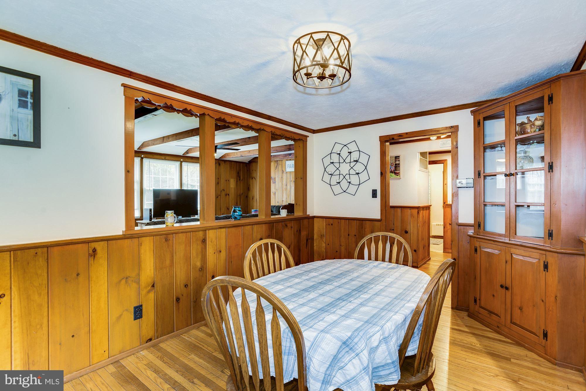 4404 Church Road Mount Laurel, NJ 08054 - Photo 10 of 22 a view of a dining room with furniture window and wooden floor