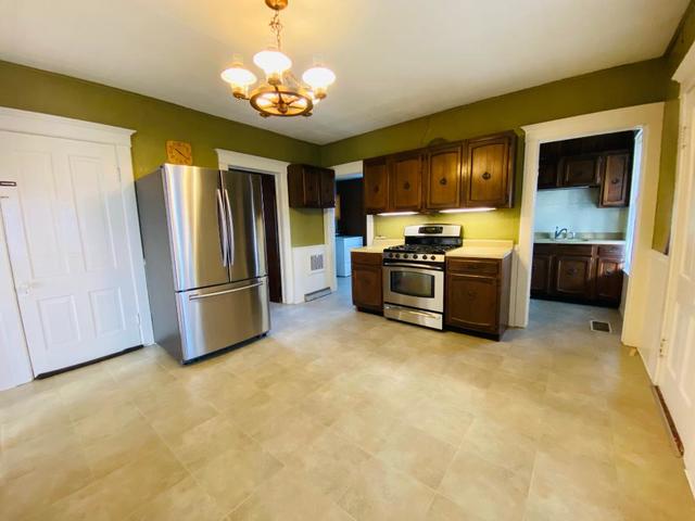 1700 West Goodfarm Road Dwight, IL 60420 - Photo 3 of 25 a kitchen with refrigerator and kitchen island