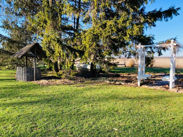 1700 West Goodfarm Road Dwight, IL 60420 - Photo 22 of 25 a view of a house with backyard porch and sitting area