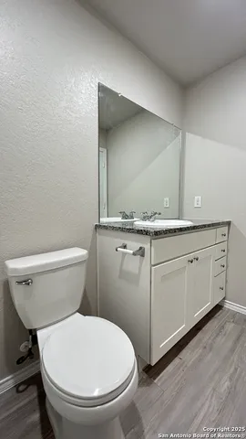 a bathroom with a toilet and a bathtub