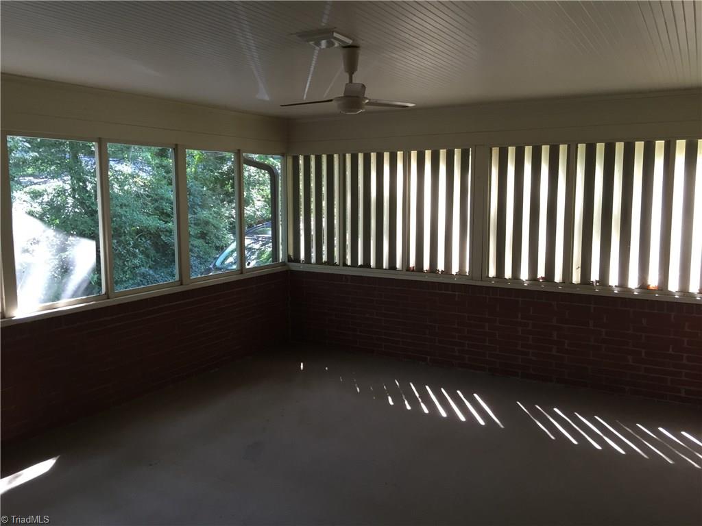 350 Robin Road Mount Airy, NC 27030 - Photo 5 of 23 Screened in porch with slatted wood for privacy. Also has glass panels that can be installed to make it a 3 season room.