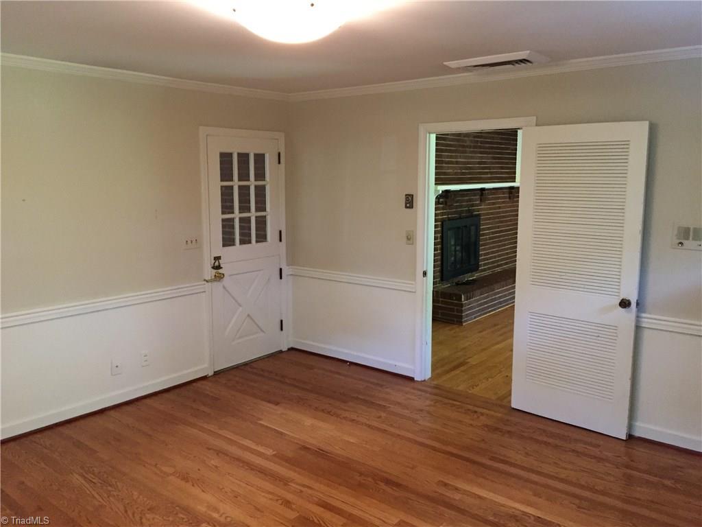 350 Robin Road Mount Airy, NC 27030 - Photo 10 of 23 Den looking back toward the family room and dutch door to screened porch