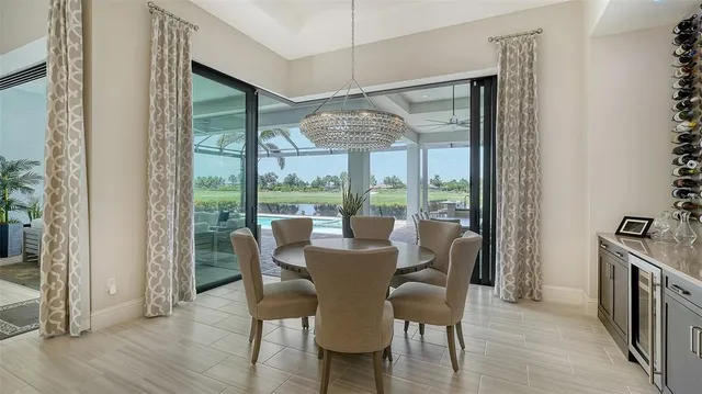 a bathroom with a granite countertop shower and a sink