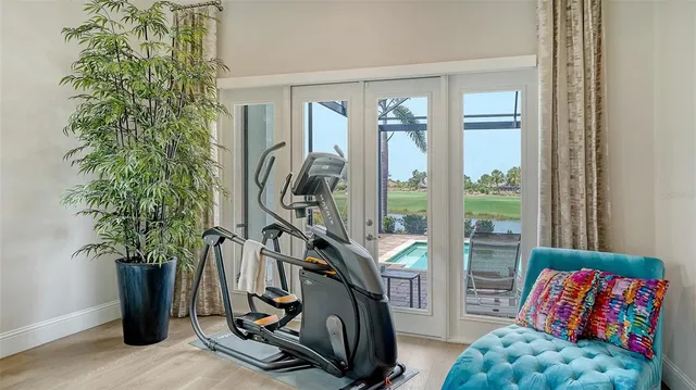 a view of a swimming pool with a patio