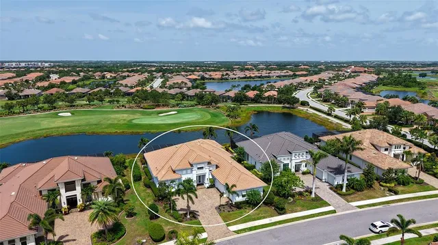an aerial view of a house with a garden