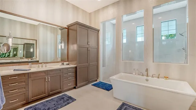 a view of a lake with houses in the back