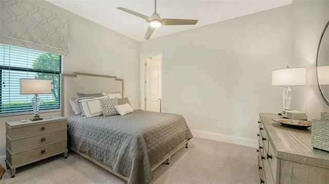 a front view of a house with a yard and a garage