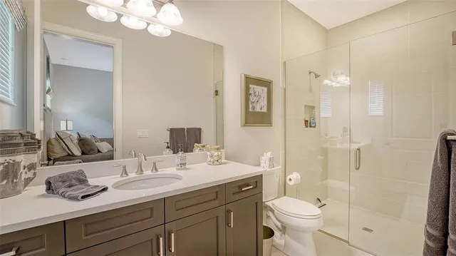 a living room with furniture and large window