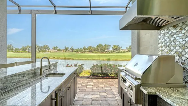 a view of a swimming pool with a yard