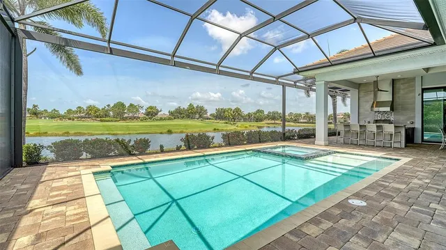 a view of a golf course with chairs