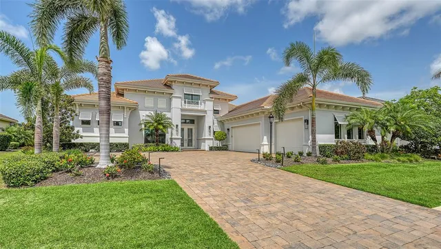 a living room with fireplace furniture and a flat screen tv