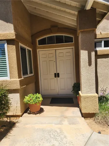 a view of a back yard of the house