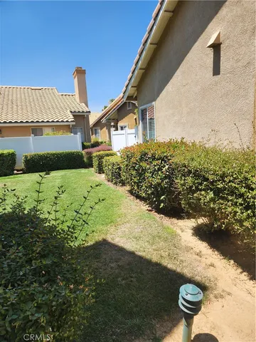 a front view of a house with yard