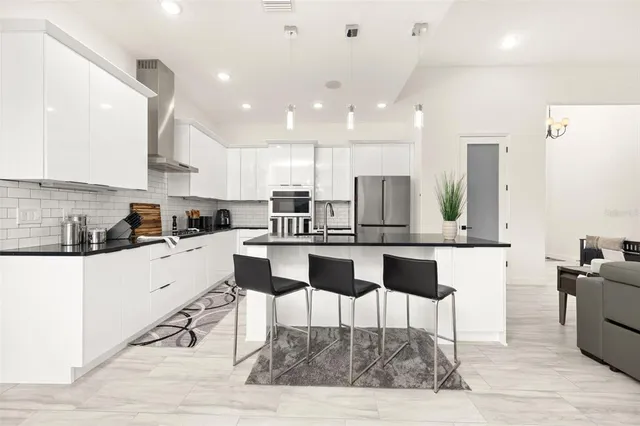 $649,900 | 2592 Heritage Green Avenue, Davenport, FL 33837