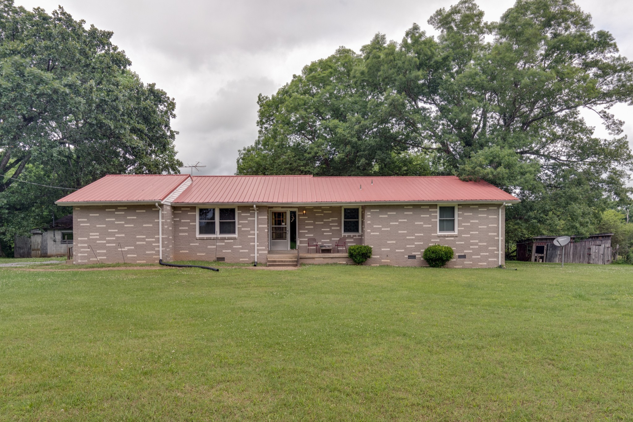 7795 Pewitt Road Franklin, TN 37064 - Photo 1 of 20 a view of a house with a yard