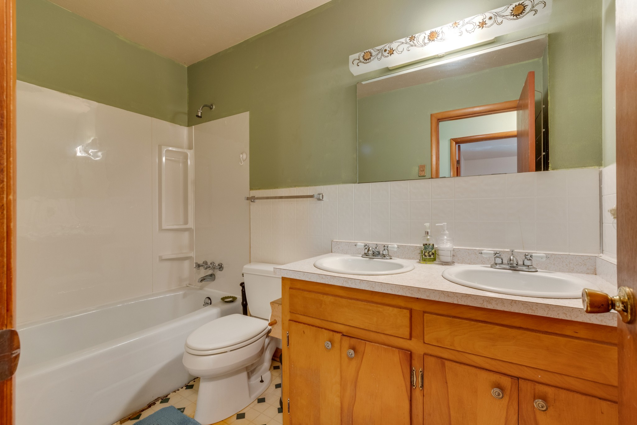 7795 Pewitt Road Franklin, TN 37064 - Photo 11 of 20 a bathroom with a sink a toilet and shower