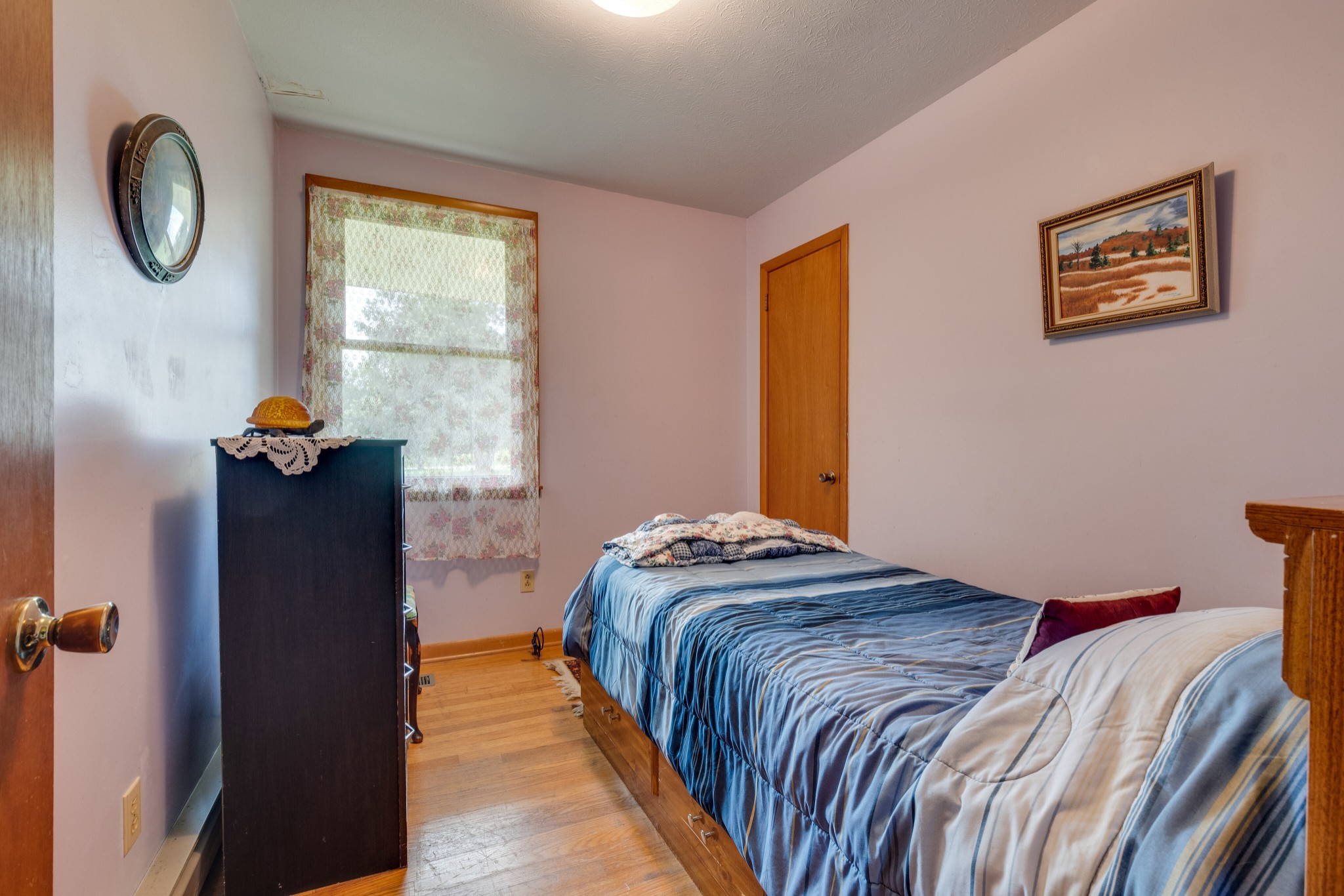 7795 Pewitt Road Franklin, TN 37064 - Photo 12 of 20 a bedroom with a bed and a window