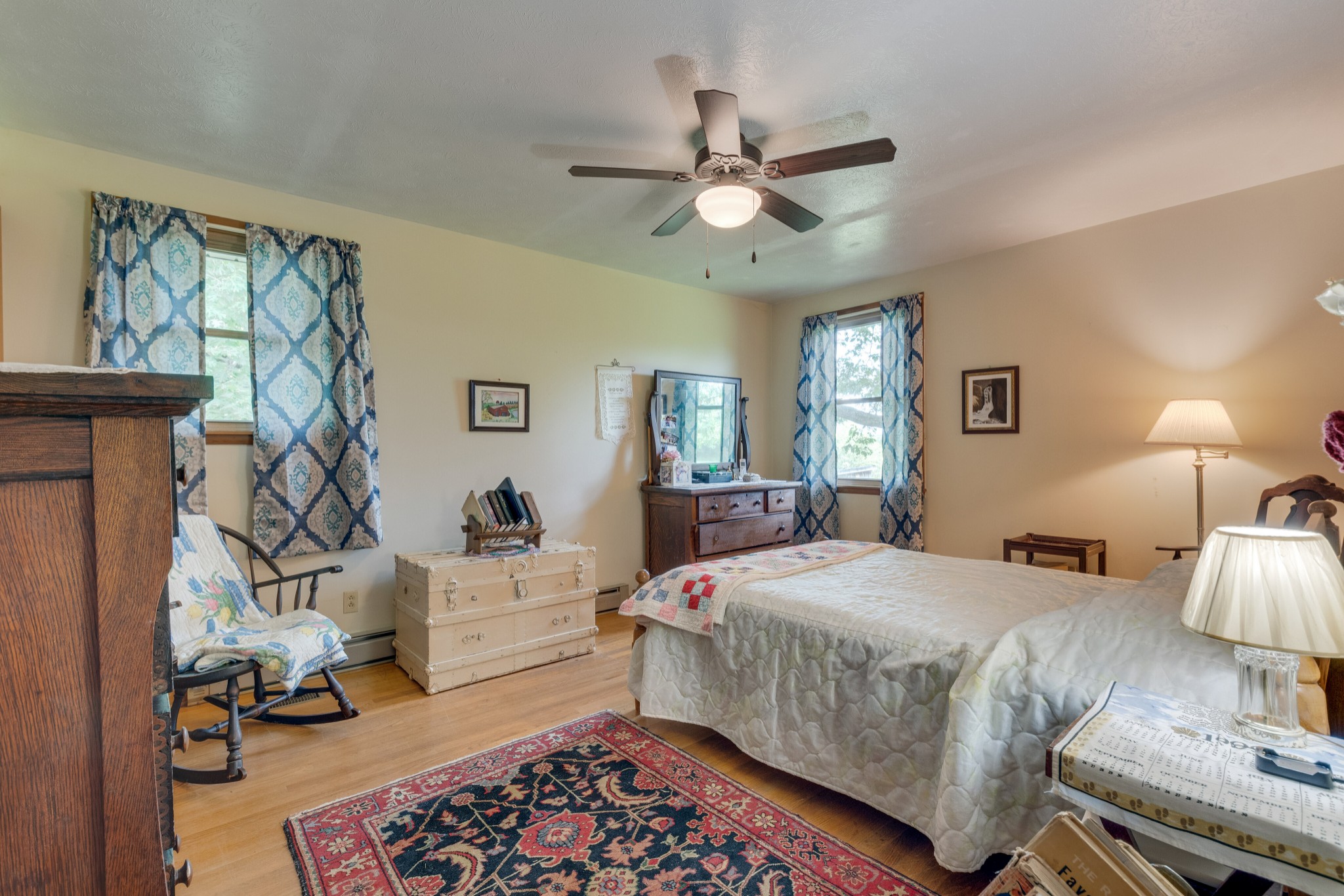 7795 Pewitt Road Franklin, TN 37064 - Photo 13 of 20 a bedroom with a bed and a chandelier