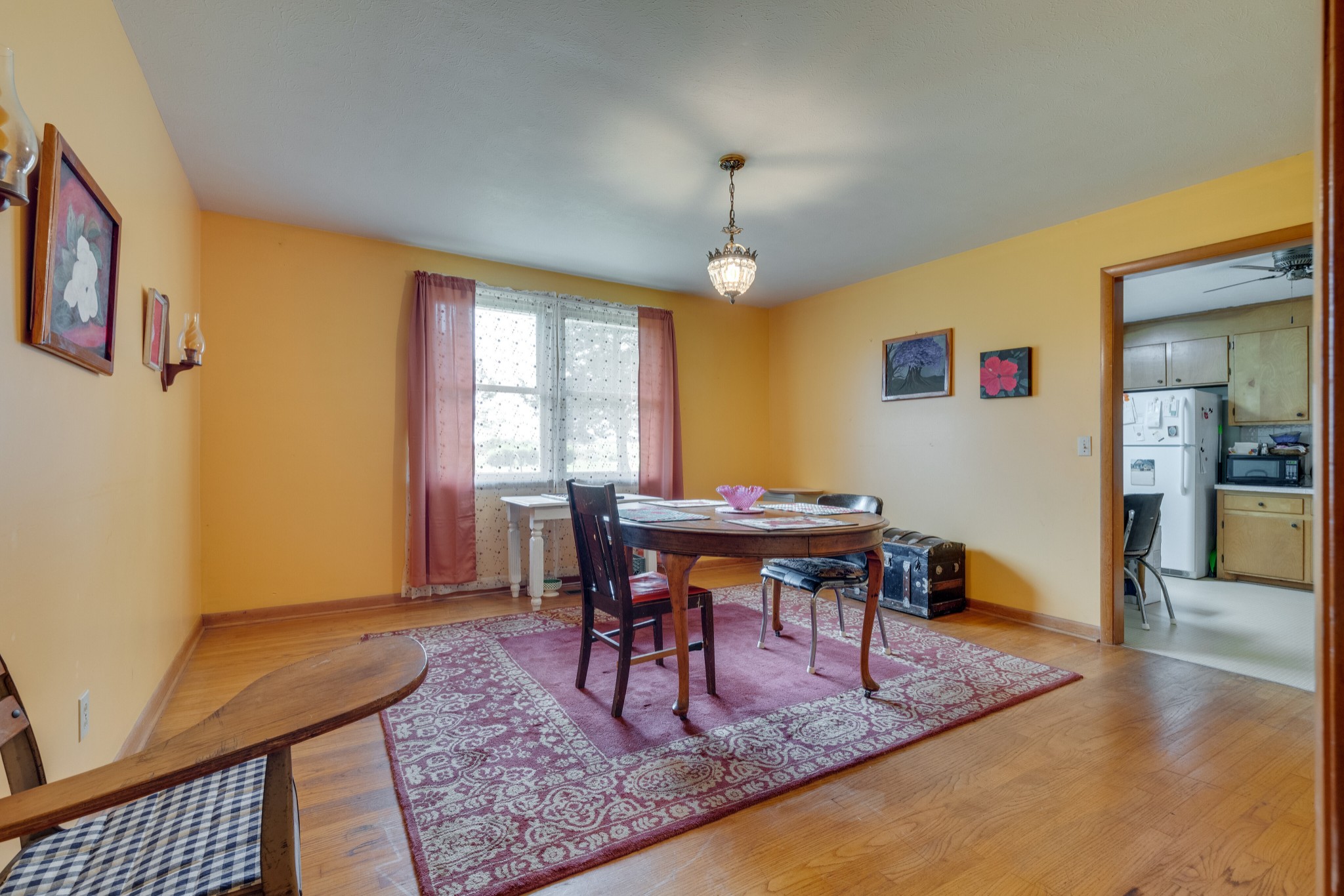7795 Pewitt Road Franklin, TN 37064 - Photo 5 of 20 a view of a dining room with furniture window and wooden floor