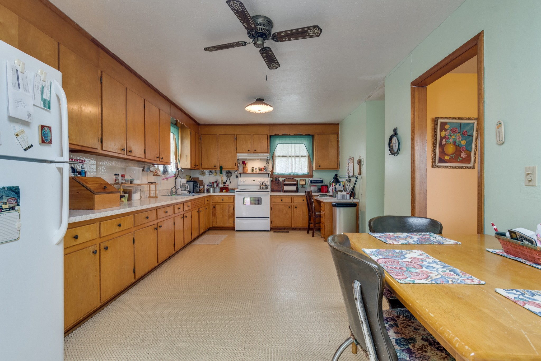 7795 Pewitt Road Franklin, TN 37064 - Photo 6 of 20 a kitchen with stainless steel appliances granite countertop a sink a stove and refrigerator