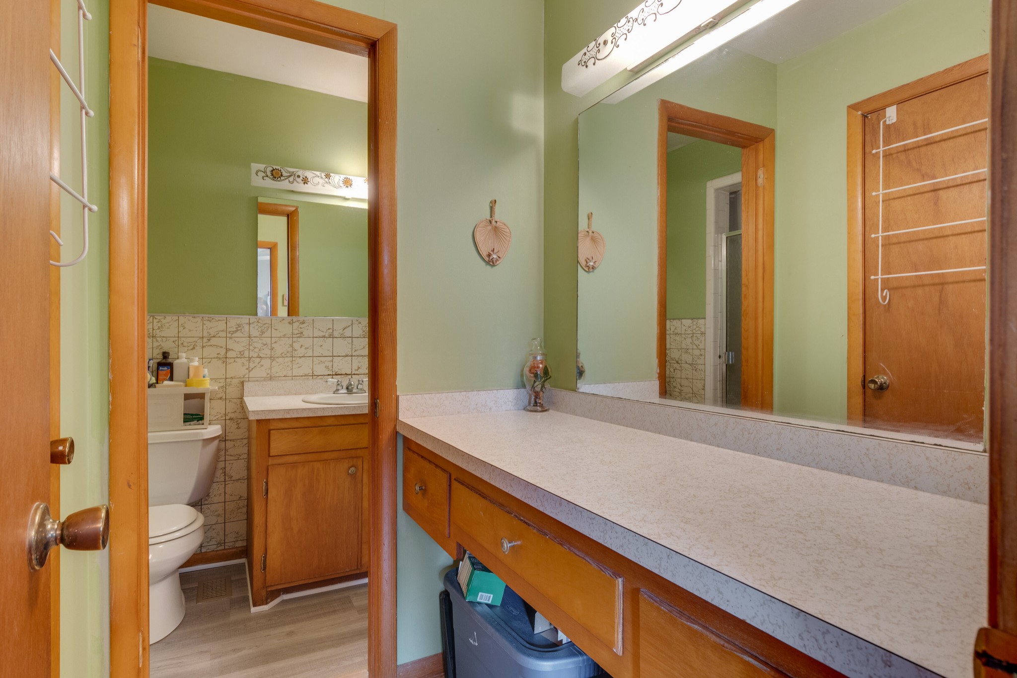7795 Pewitt Road Franklin, TN 37064 - Photo 9 of 20 a bathroom with a sink and a mirror