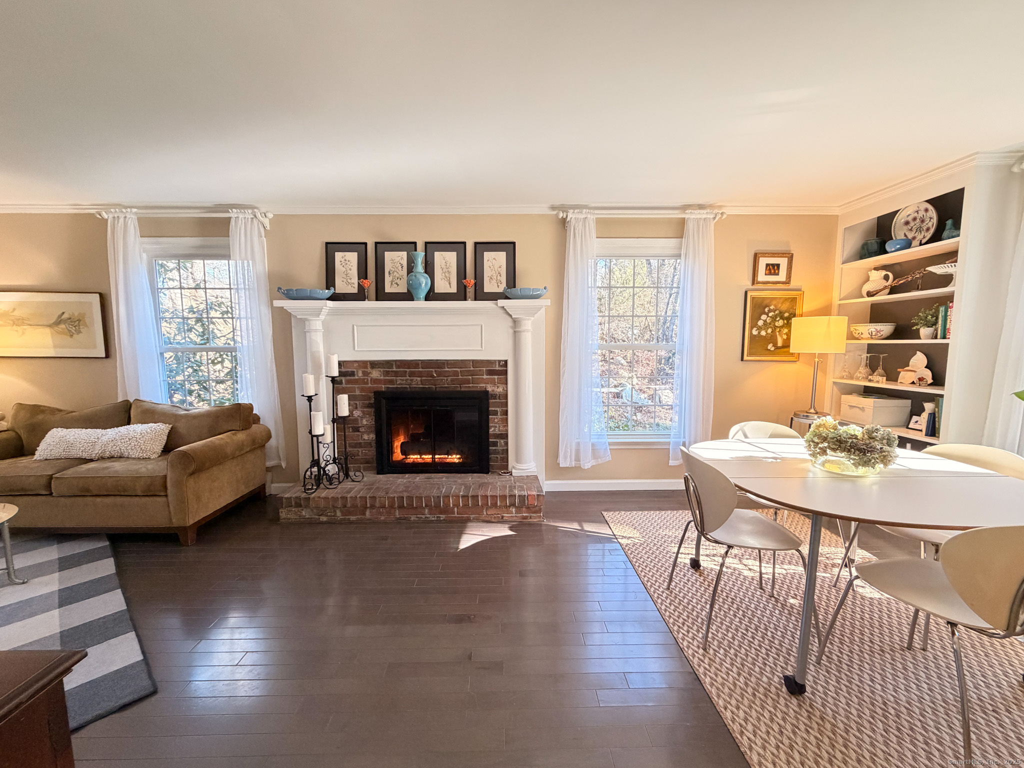 104 Pulpit Rock Road Woodstock, CT 06281 - Photo 13 of 37 a living room with furniture and a fireplace