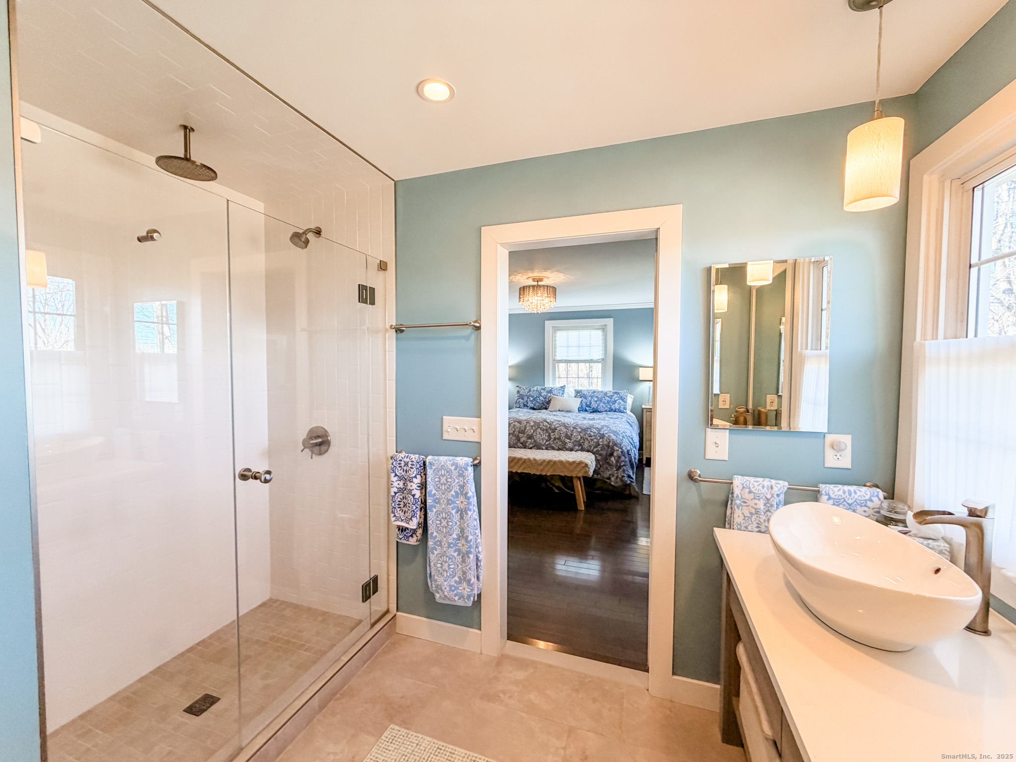 104 Pulpit Rock Road Woodstock, CT 06281 - Photo 15 of 37 a en suite bathroom with a tub shower and mirror