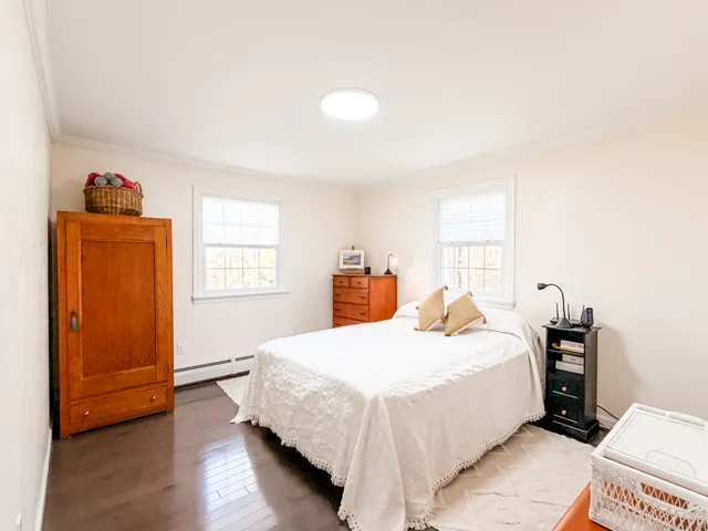 a bedroom with a bed and a closet