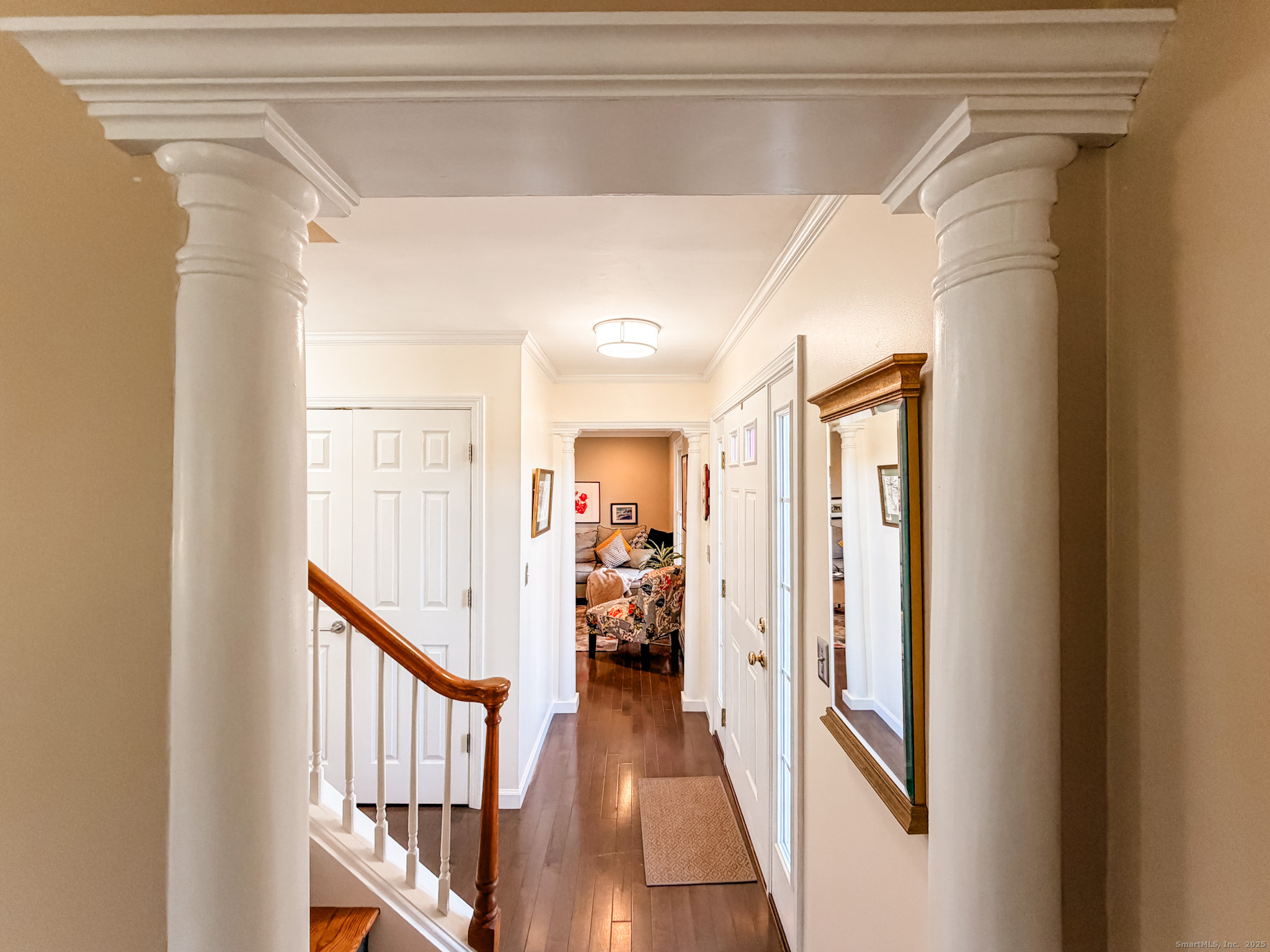 104 Pulpit Rock Road Woodstock, CT 06281 - Photo 21 of 37 a view of a hallway with wooden floor and windows