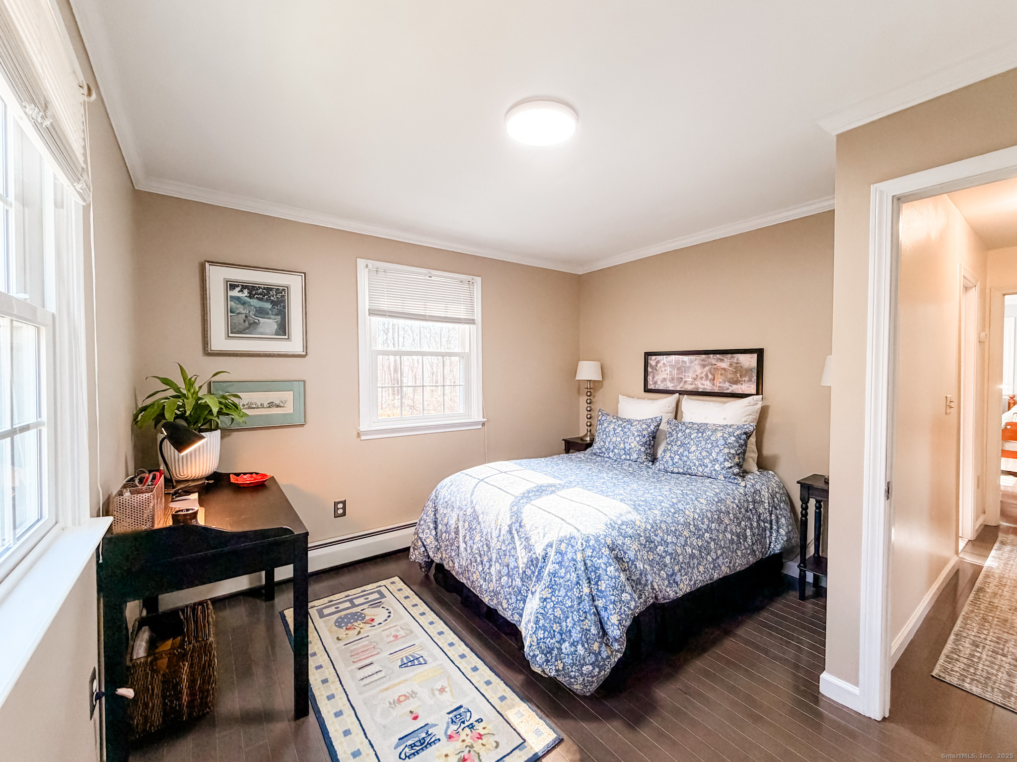104 Pulpit Rock Road Woodstock, CT 06281 - Photo 24 of 37 a bedroom with a bed table chair and a window