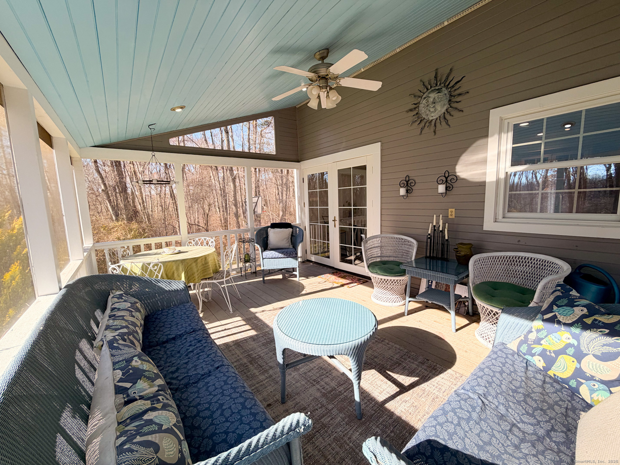 104 Pulpit Rock Road Woodstock, CT 06281 - Photo 29 of 37 a living room with furniture and a large window