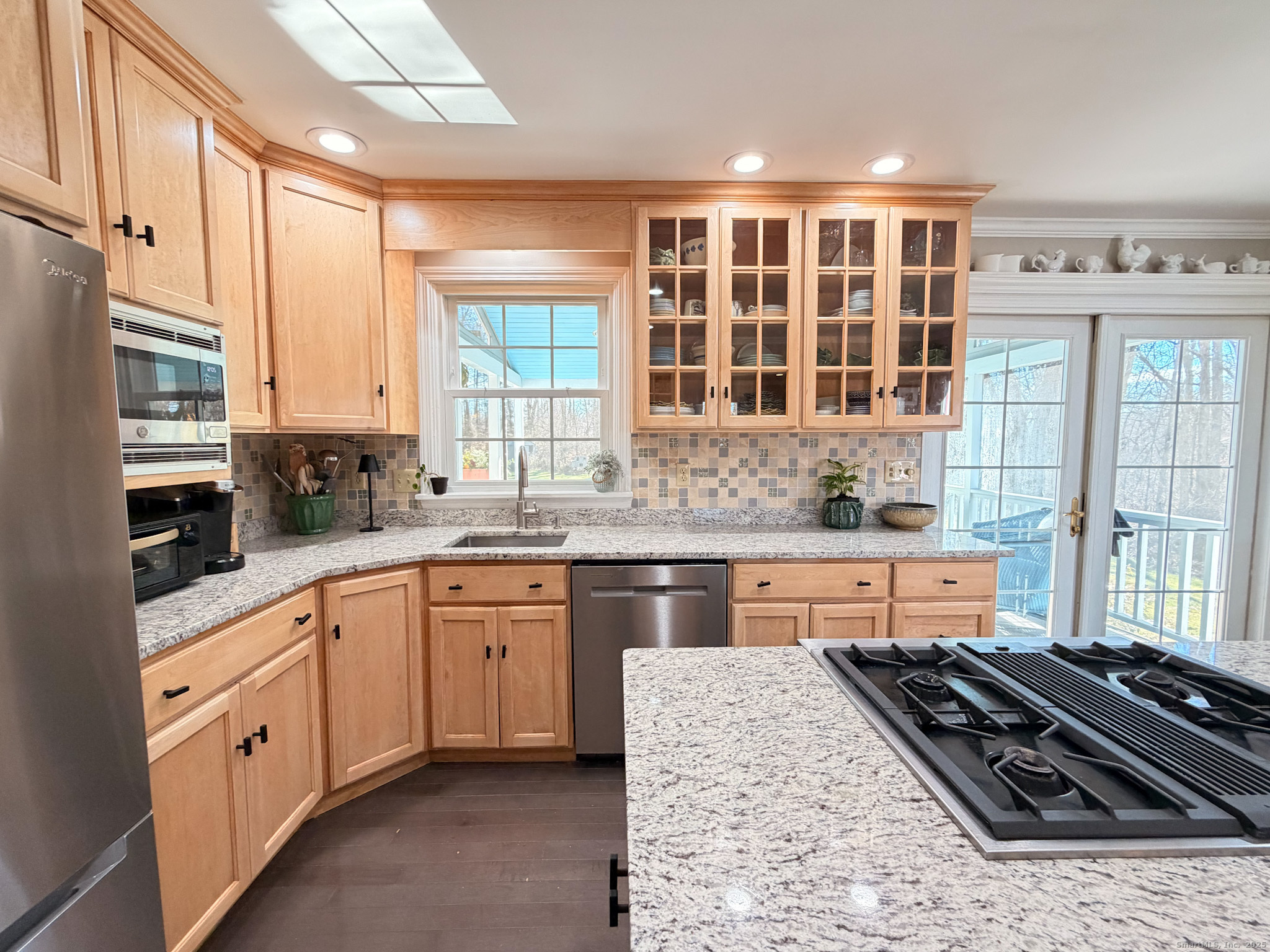 104 Pulpit Rock Road Woodstock, CT 06281 - Photo 3 of 37 a kitchen with stainless steel appliances granite countertop a stove and a sink