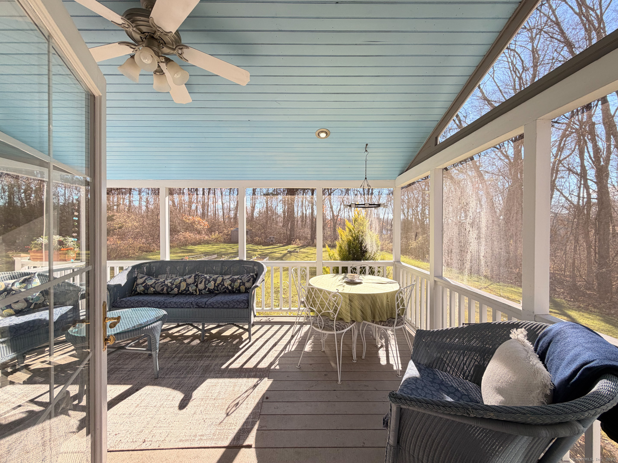 104 Pulpit Rock Road Woodstock, CT 06281 - Photo 33 of 37 a living room with furniture and a large window