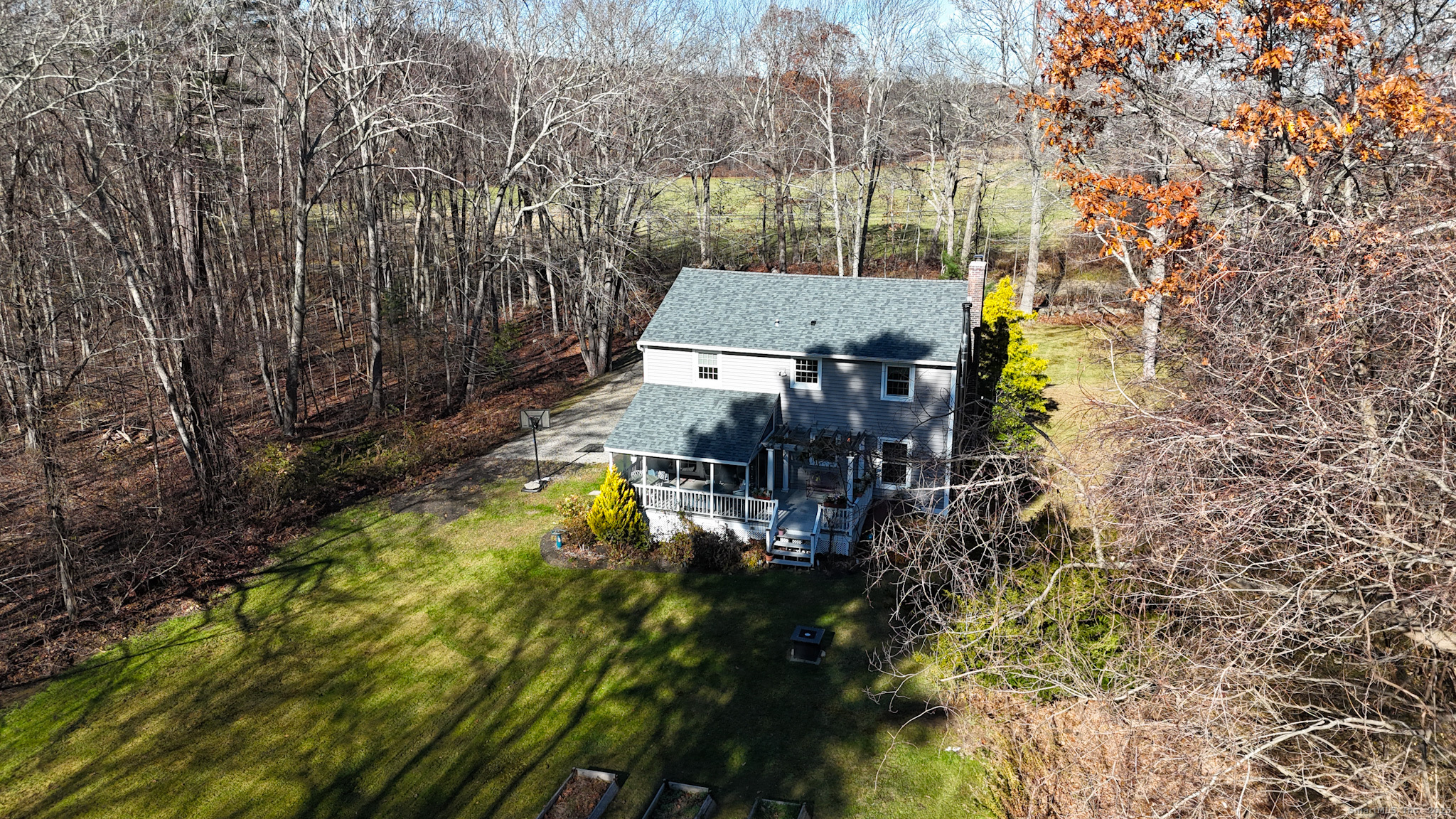 104 Pulpit Rock Road Woodstock, CT 06281 - Photo 36 of 37 a aerial view of a house with yard swimming pool and outdoor seating