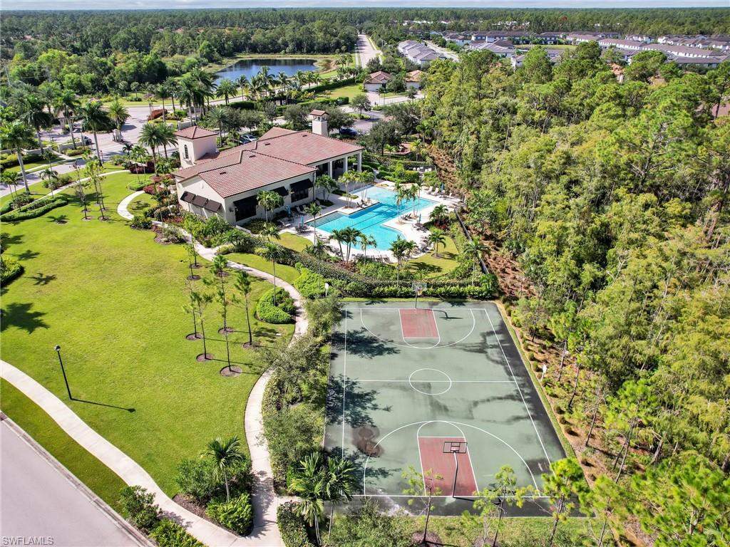 4383 Bismark Way Naples, FL 34119 - Photo 48 of 49 Aerial View of Clubhouse, Community Pool, & Basketball Courts