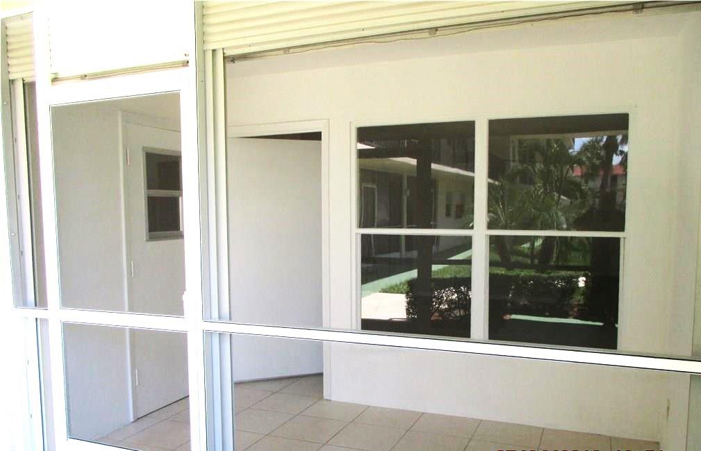 804 Southeast 7th Street, Unit 101 Deerfield Beach, FL 33441 - Photo 2 of 14 a view of a door and a window
