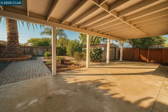 a view of swimming pool with a patio