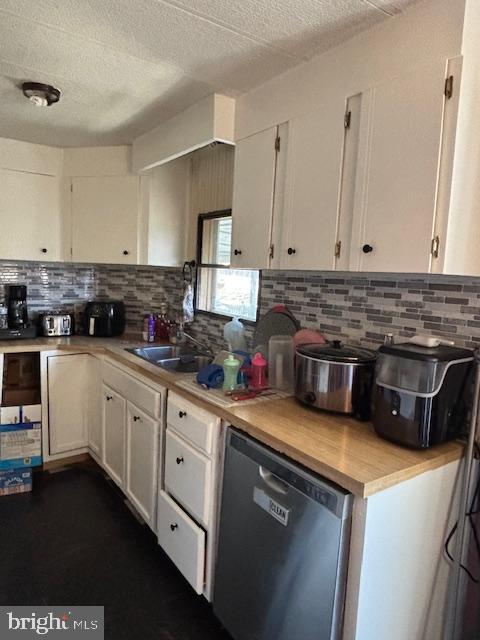 1375 Fried Meat Ridge Road Keyser, WV 26726 - Photo 27 of 52 a kitchen with stainless steel appliances granite countertop a stove a sink and a white cabinets